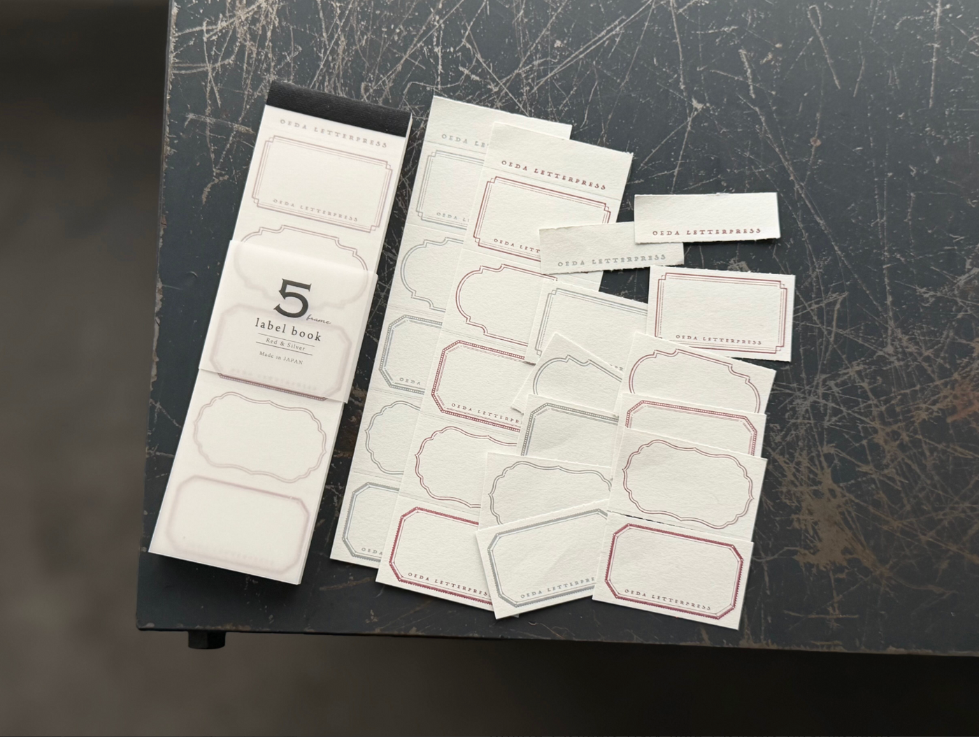 OEDA LETTERPRESS 5 Frame Label Book - Silver & Red