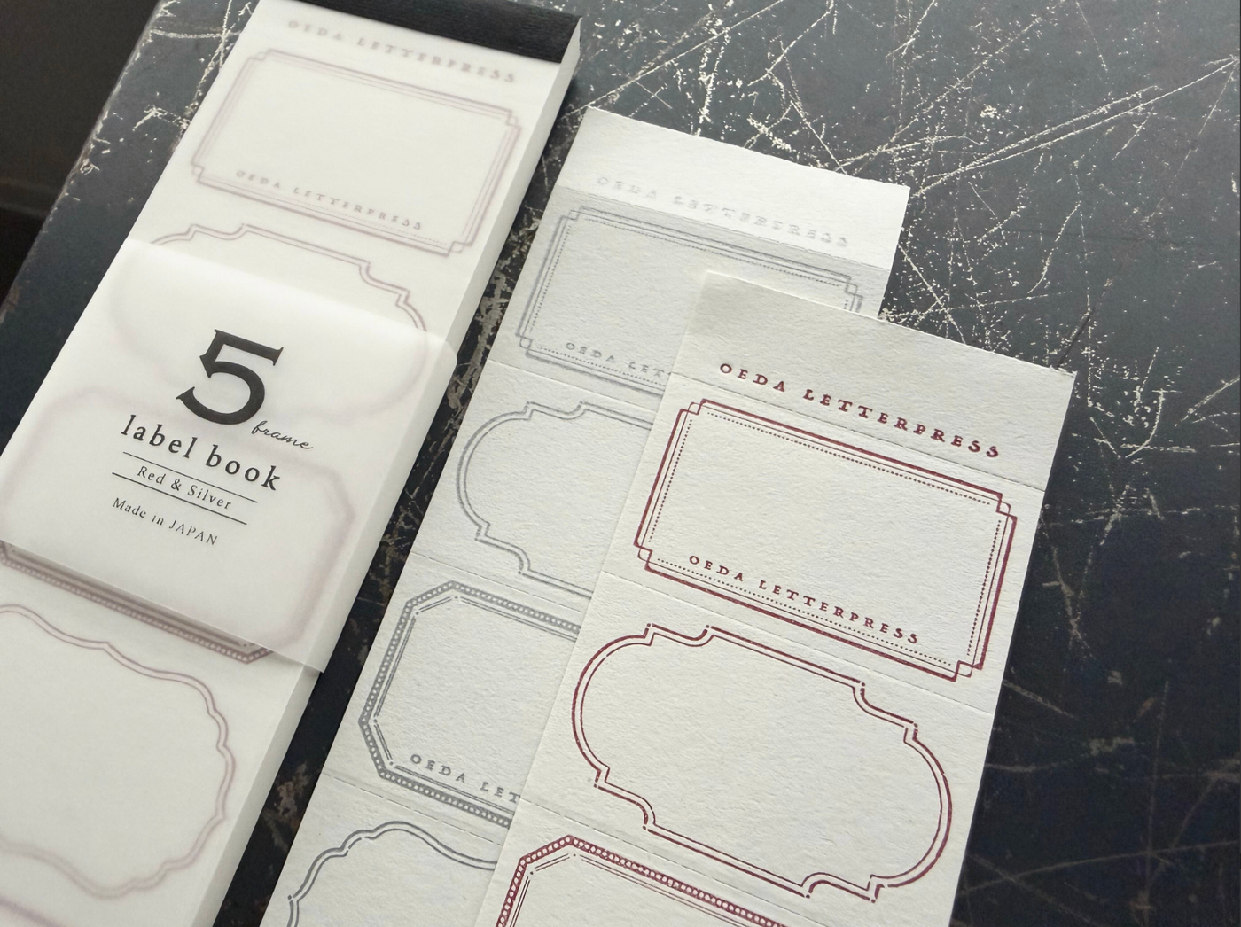 OEDA LETTERPRESS 5 Frame Label Book - Silver & Red